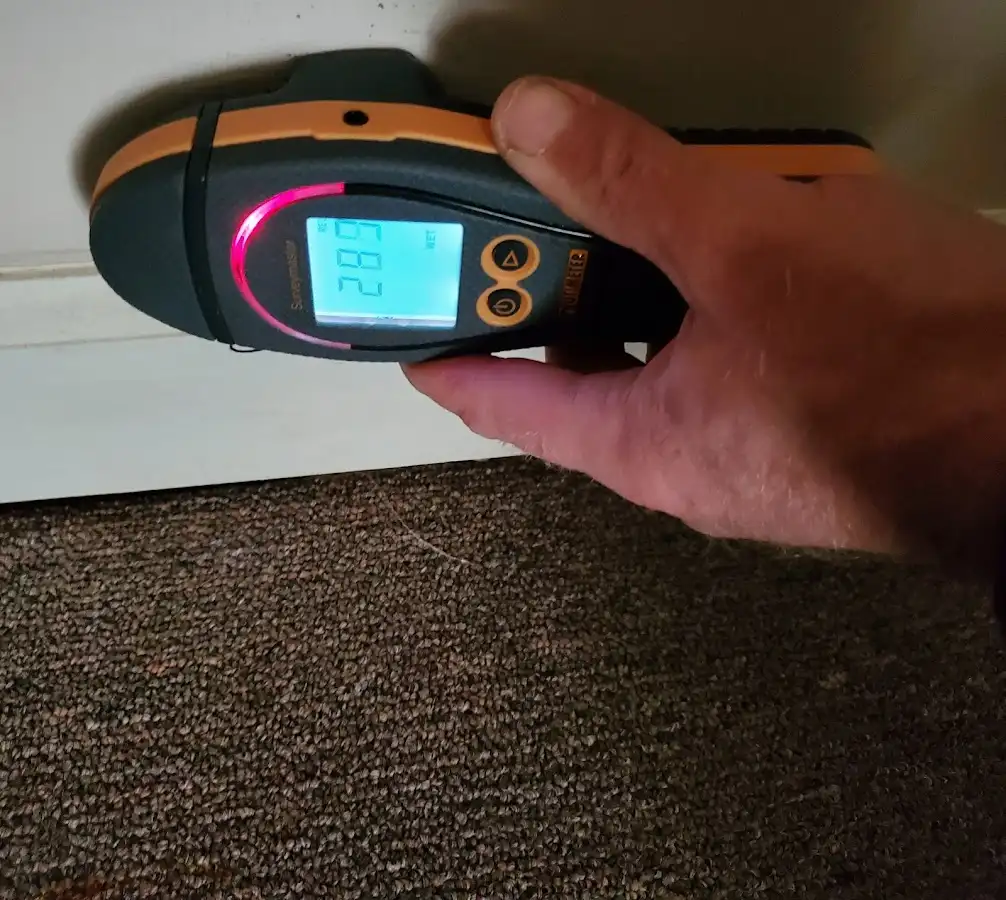 Moisture detection at baseboard during Burst Pipe Cleanup in Summerlin South